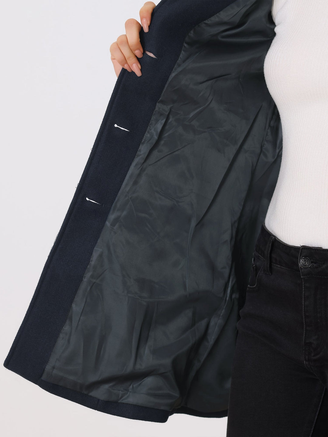 Classic tailored women's winter trench coat, single-breasted design, elegant city outerwear.