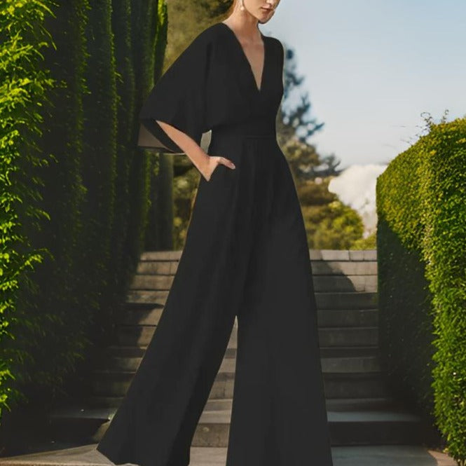 Aurora Chic ladies V-neck jumpsuit, featuring elegant 3/4 sleeves, a versatile and stylish choice for women's fashion.
