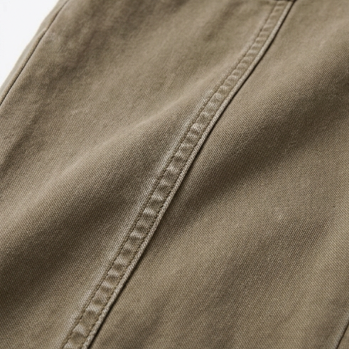 Versatile dark green women's pants; high waist, tapered fit, and utility pockets for functional style.