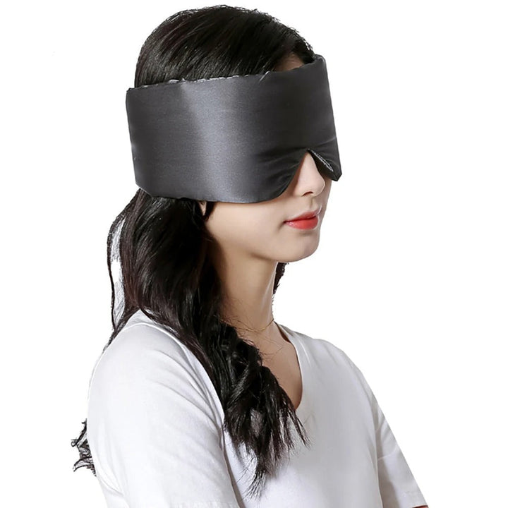 Luxury silk sleep mask in premium packaging. Ideal gift for deep rest & relaxation. Unisex eye mask.