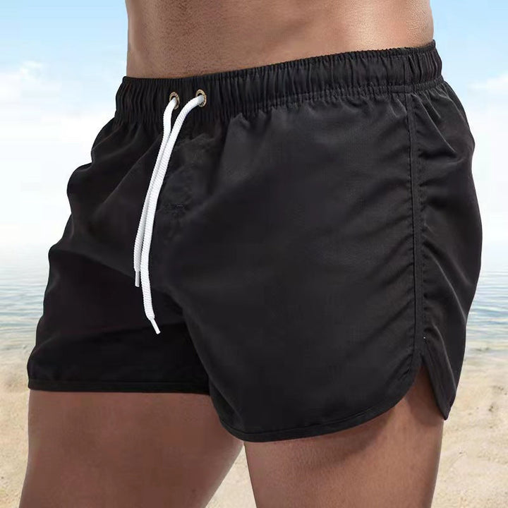 Men's quick-dry swim shorts for beach and water. Fast-dry fabric, comfortable fit, perfect for summer activities.