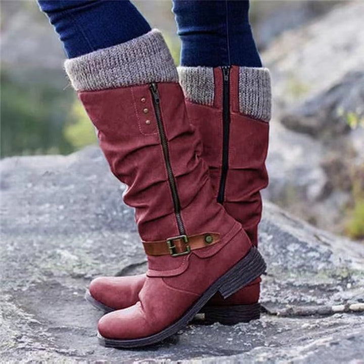 Classic women's elegant knee-high boots, featuring a sleek design, side zipper & durable non-slip sole.