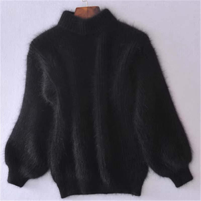 Cozy women's loose pullover sweater. Effortless style with a comfortable, long sleeve design for winter.