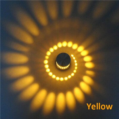 Colorful spiral LED light fixture, versatile for wall or ceiling. Modern decorative lighting, energy-efficient.