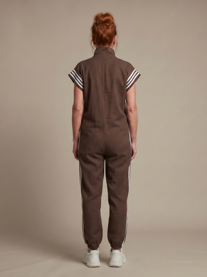 Full-length women's zip front casual jumpsuit with striking stripe panel details.