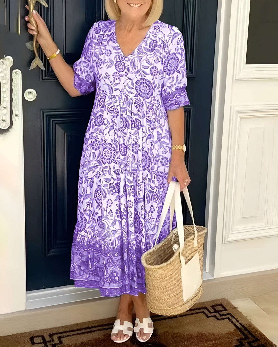 Flowy tiered floral midi dress for women, featuring a flattering V-neck and stylish 3/4 sleeves for casual elegance.