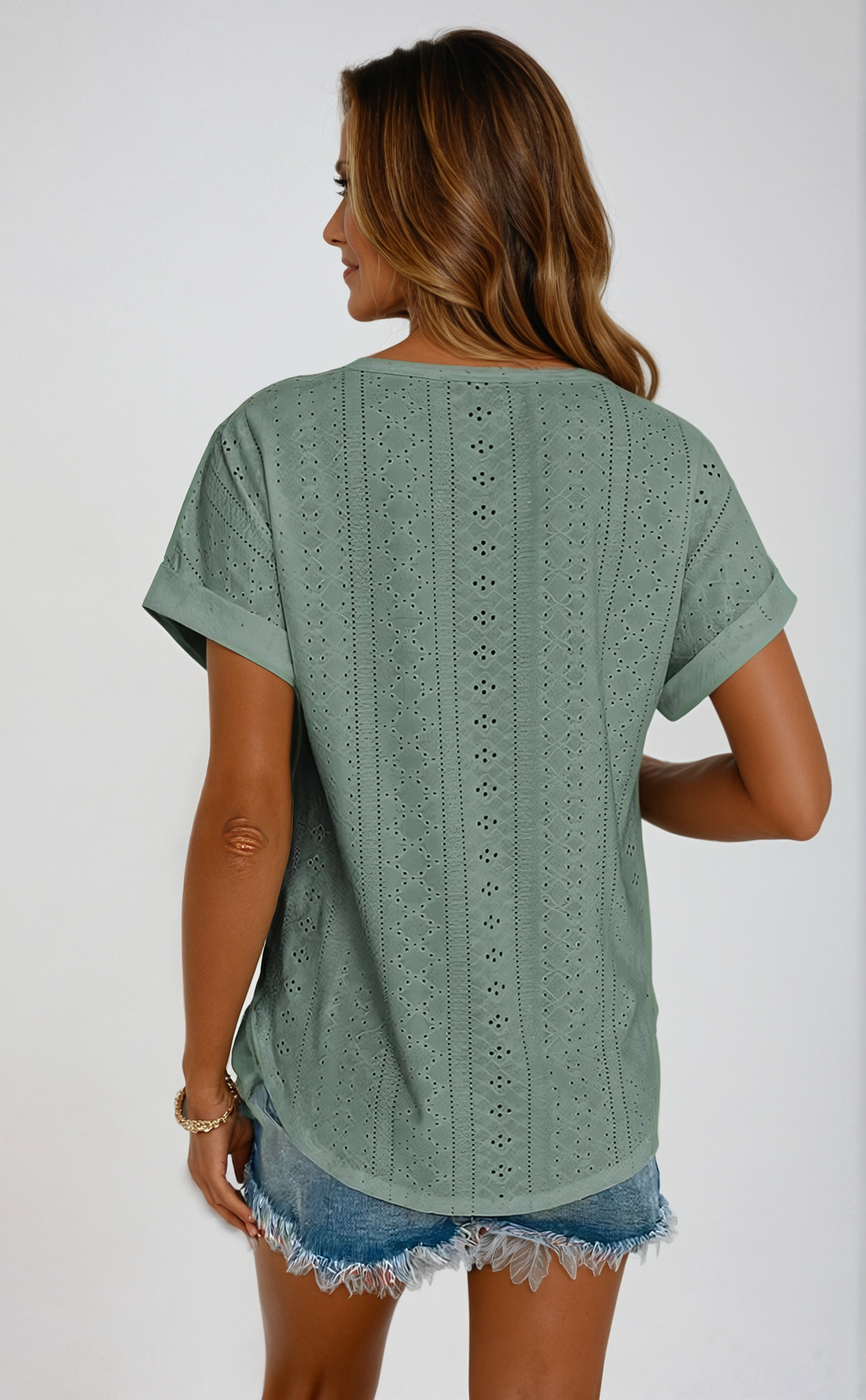 Versatile women's summer top, eyelet fabric, short sleeves, easy relaxed fit for casual style.