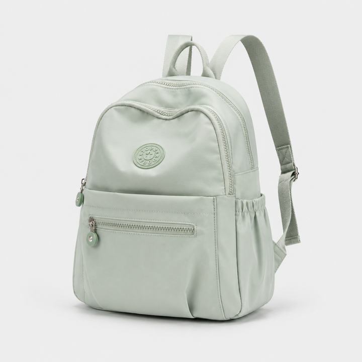 Secure nylon mini backpack for daily essentials, featuring multiple pockets for organized carry.