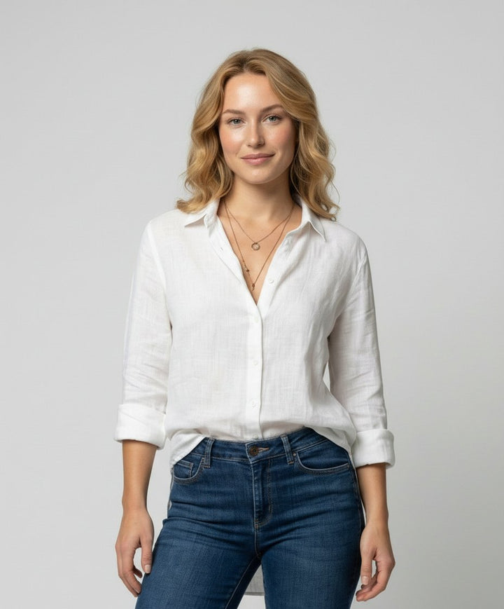 Women's timeless relaxed-fit button-up shirt in a versatile solid color, perfect for everyday wear.