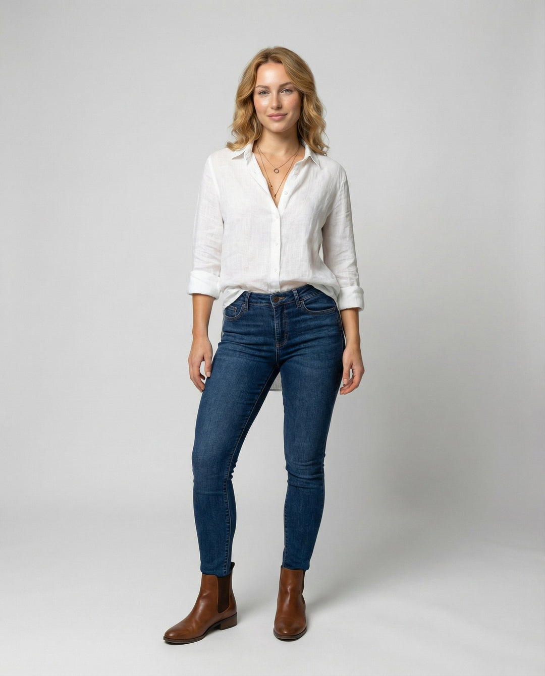 Chic women's relaxed-fit button-up shirt for smart casual office wear or stylish everyday spring fashion.