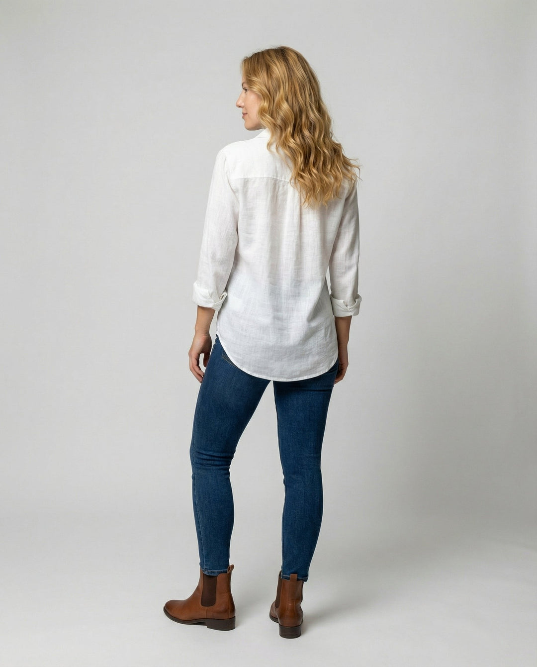 Versatile women's button-up shirt with a relaxed fit, ideal for summer, spring, or smart casual outfits.