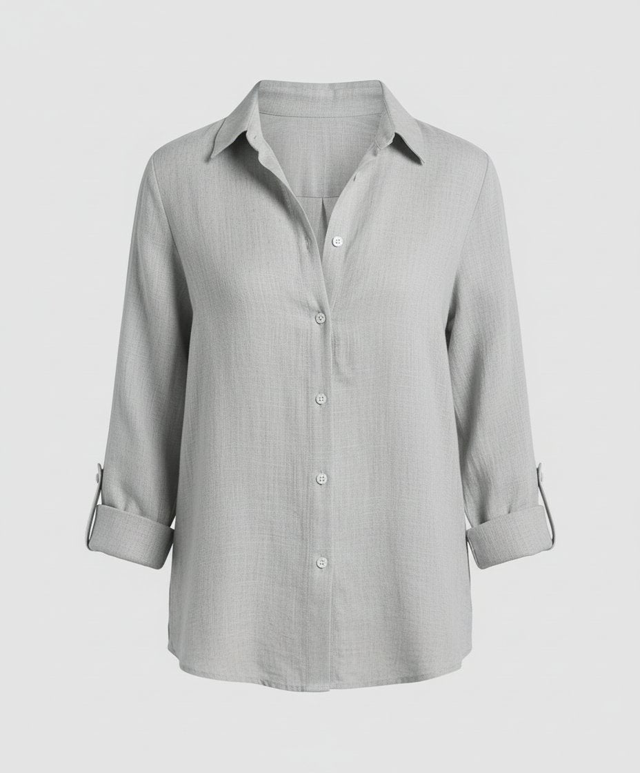 Smart casual women's relaxed-fit button-up shirt, suitable for office wear or chic everyday looks.