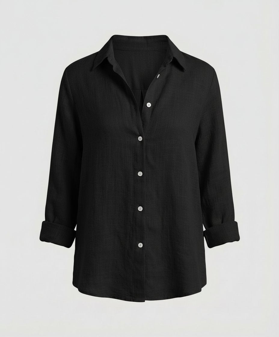 Elegant women's relaxed-fit button-up shirt, a versatile top for sophisticated casual and office styles.
