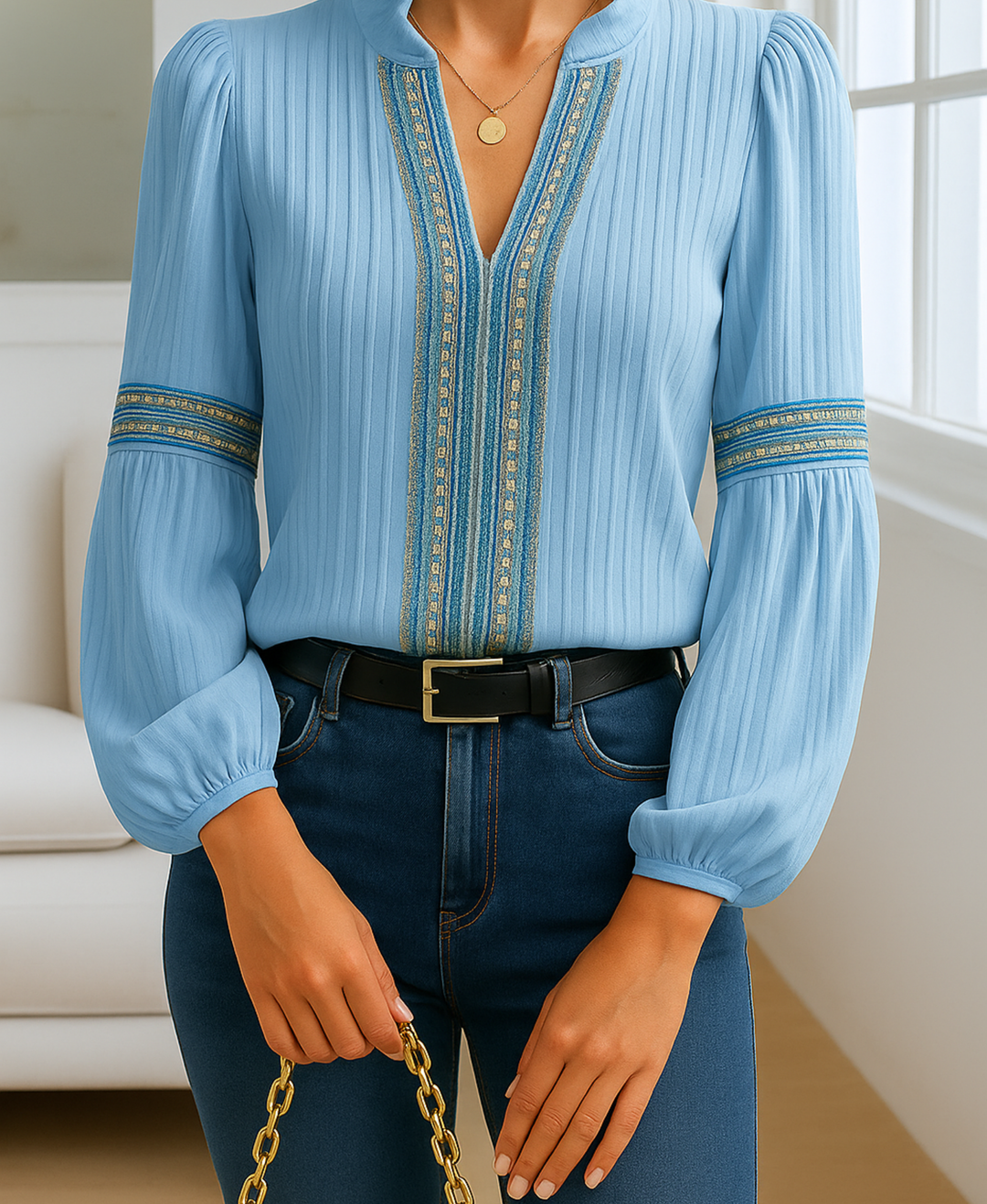 Stylish women's V-neck blouse featuring intricate embroidery on long sleeves & neckline.