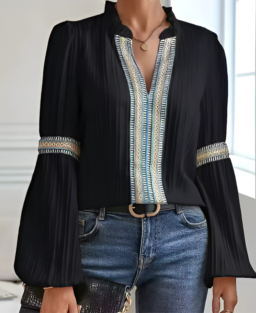Relaxed fit women's long sleeve V-neck blouse, versatile casual top with elegant embroidery.