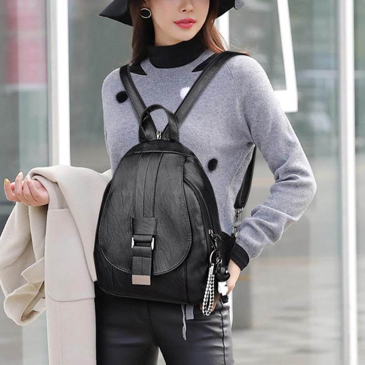Versatile women's leather backpack, water-resistant. Anti-theft shoulder bag for travel & city.