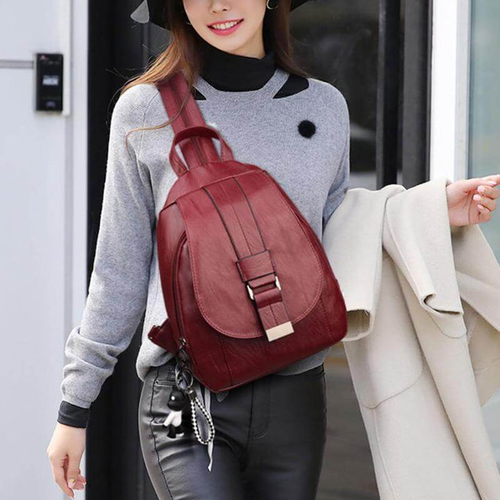 Sleek women's premium leather backpack, water-resistant. Anti-theft features for secure travel.