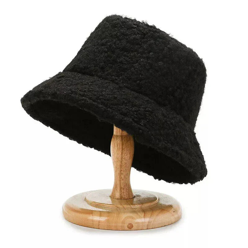 Comfortable women's plush winter bucket hat, ideal for cozy warmth & fashionable headwear.