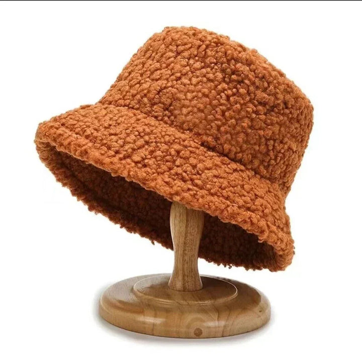 Soft faux fur Livia bucket hat for women, providing warmth and a chic winter look.