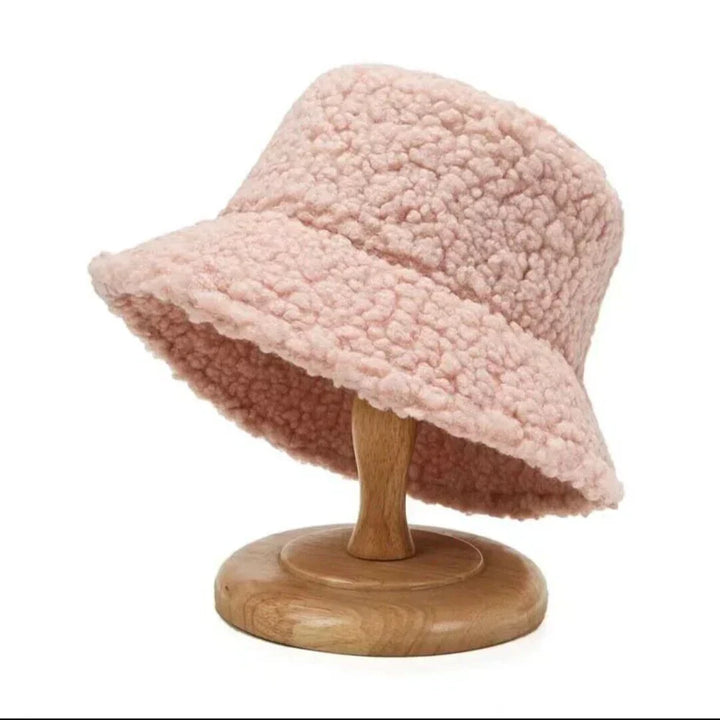 Fashionable women's plush bucket hat, Livia model, providing ultimate warmth & comfort for winter.