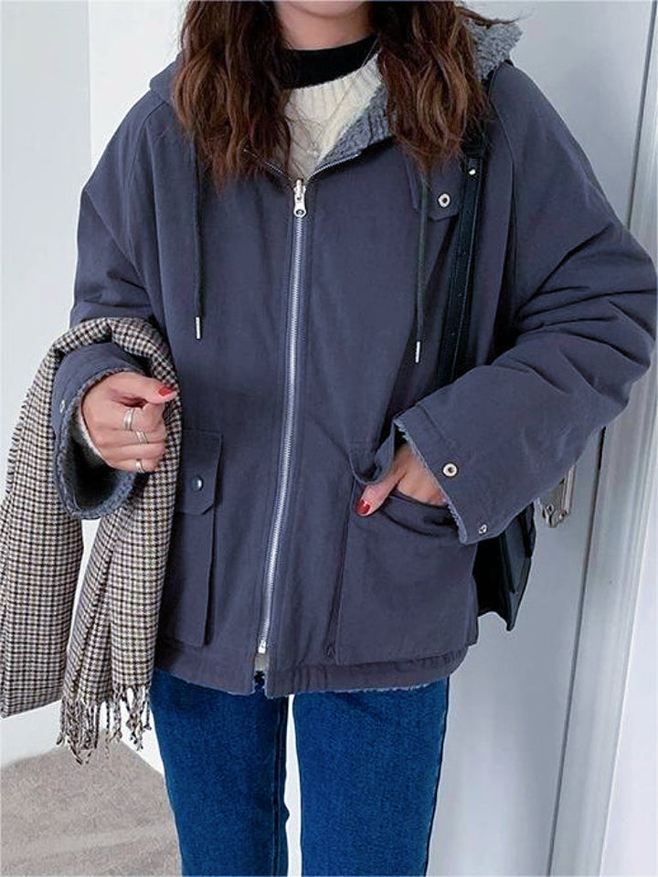 Versatile women's oversized hooded jacket. Reversible warm parka, perfect for casual everyday winter wear.