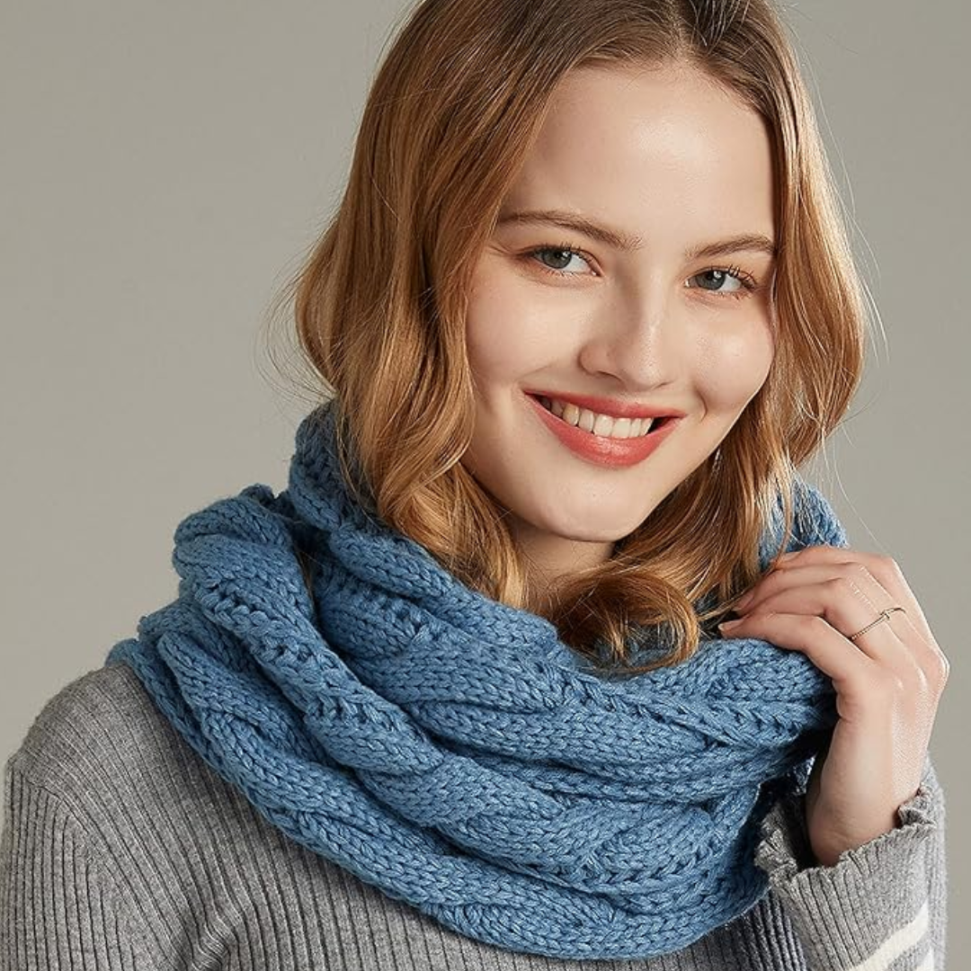 This women's warm ribbed knitted scarf is a perfect winter fashion accessory.