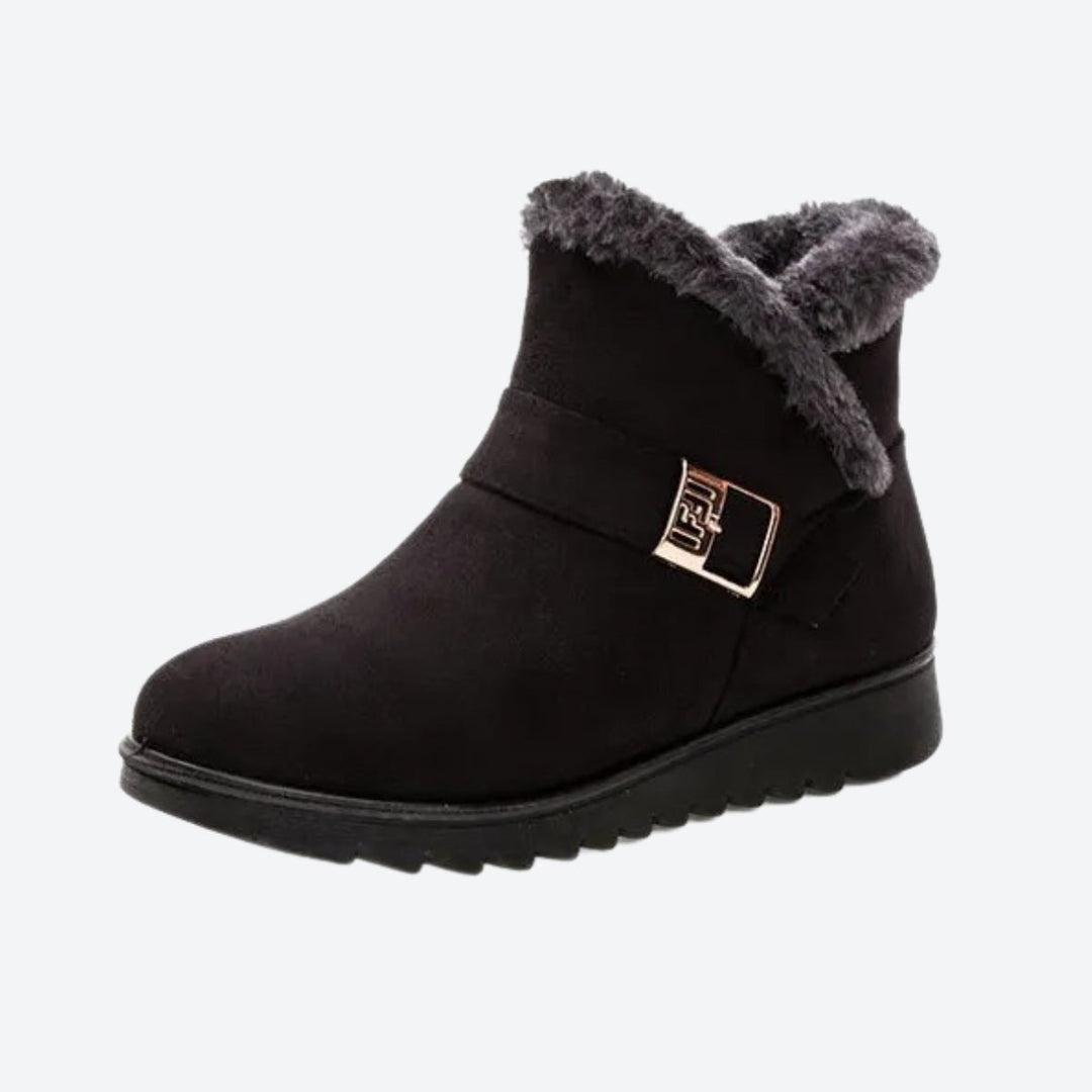 Comfortable women's snow boots, waterproof design for cold weather adventures.