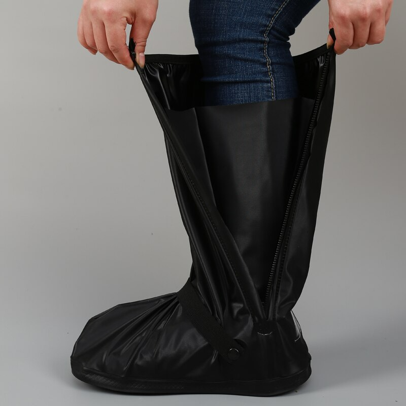 Portable DryTrek rain gear shoe covers, shielding any footwear from water, mud, and dirt. Unisex design.