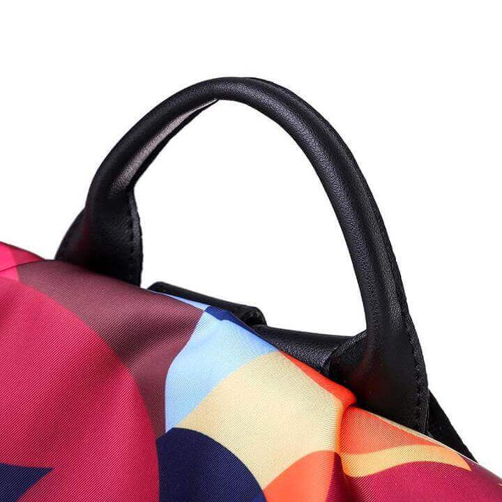 Woman wearing SafeHold anti-theft backpack, perfect for daily commute, school, or travel; water-resistant.