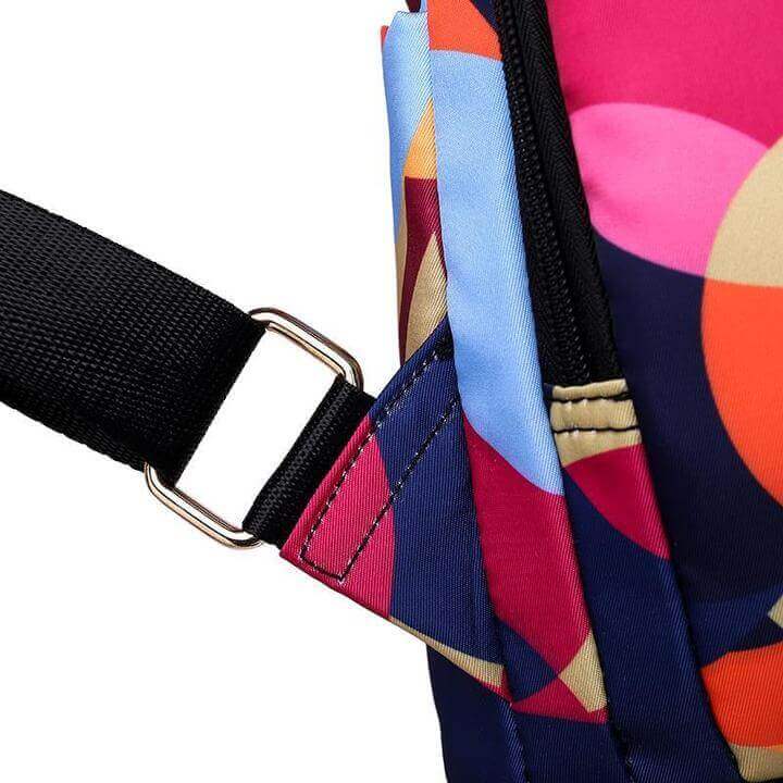 Organized SafeHold women's anti-theft backpack, showcasing multiple compartments with laptop, books & essentials.