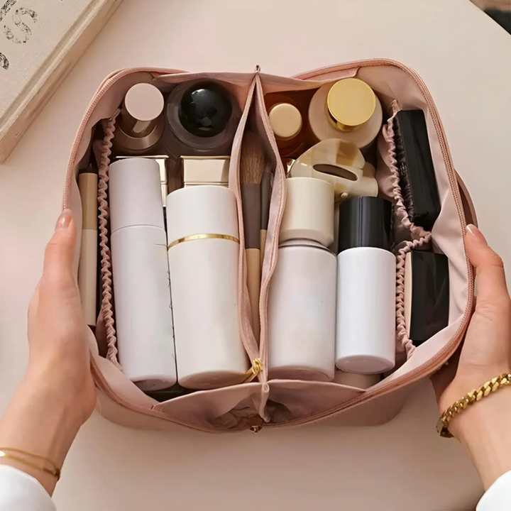Black waterproof makeup bag for women, perfect travel toiletry organizer with durable design.