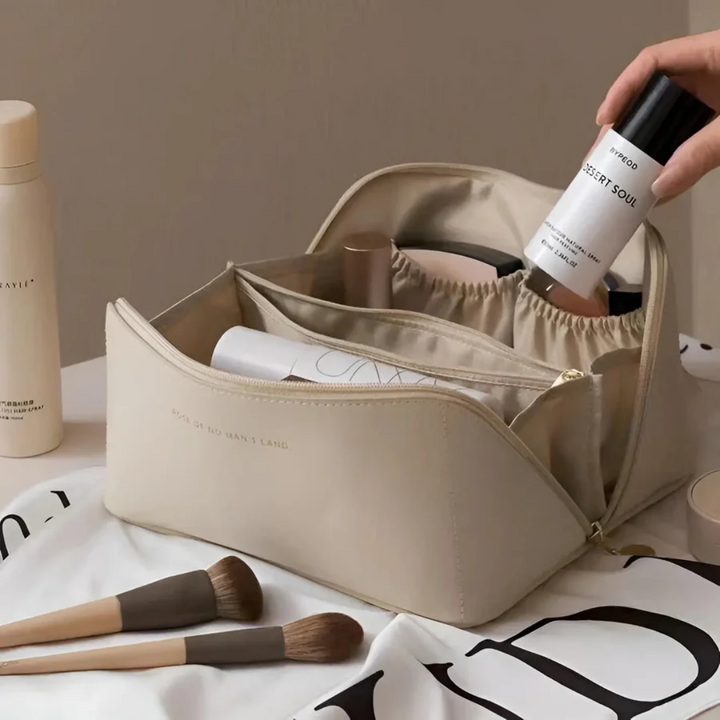 Versatile travel cosmetic bag for women, waterproof and stylish in various colors like white & brown.