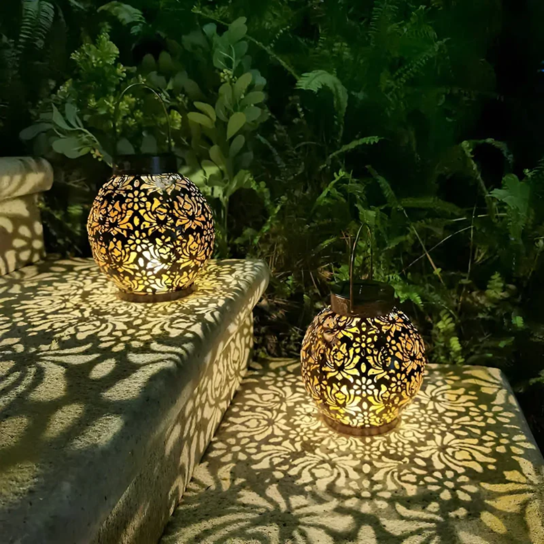 Stylish wrought iron solar LED hanging lantern. Durable & waterproof for outdoor garden and patio lighting.
