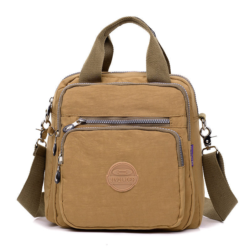 Lightweight women's waterproof crossbody bag, ideal as a shoulder bag, travel bag, or compact backpack purse.