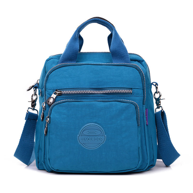 Modern women's waterproof multifunctional crossbody bag. A chic handbag perfect for organizing travel necessities.