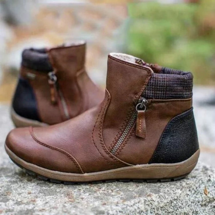 Premium women's waterproof orthopedic boots with zipper. Offers support, comfort, and durability.