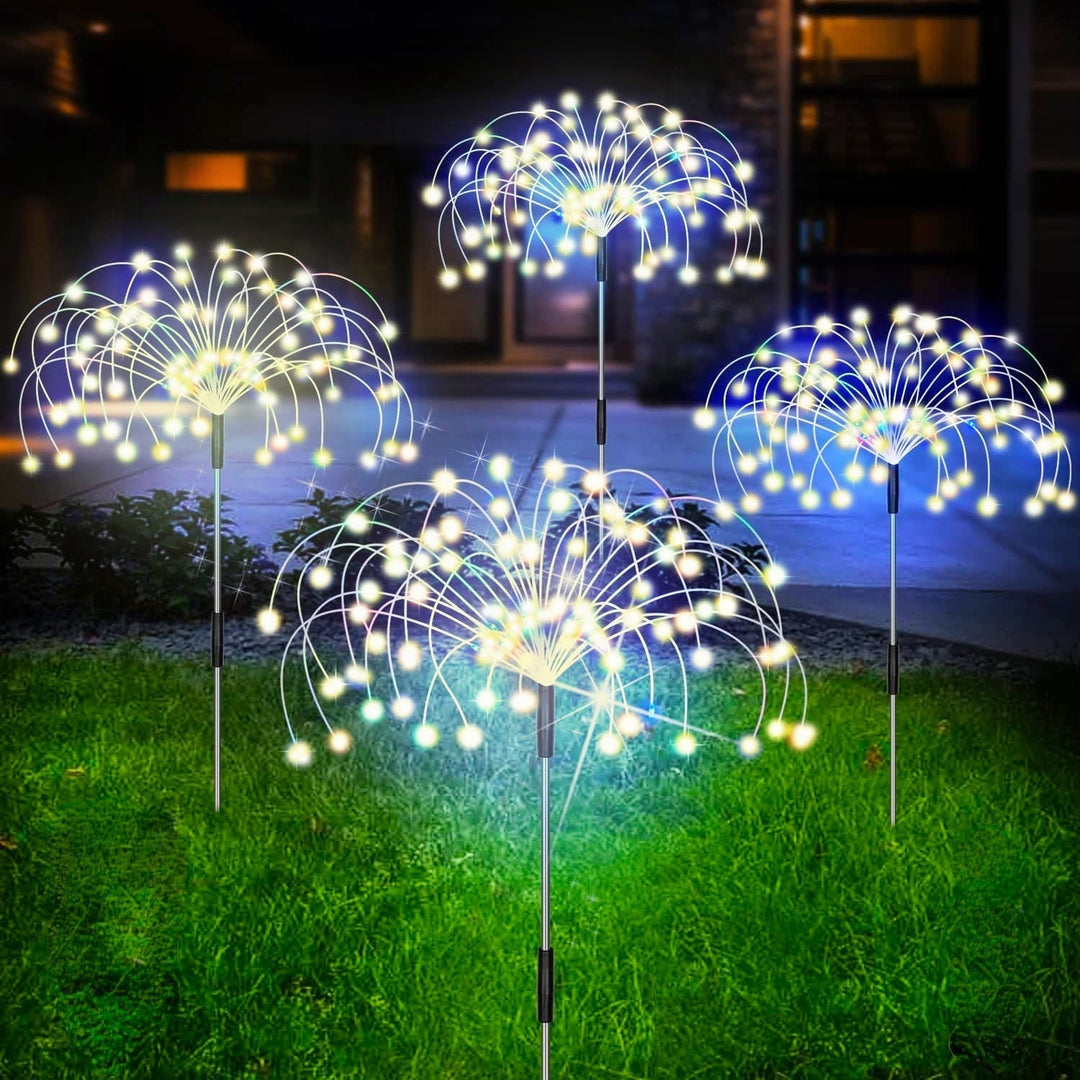Solar-powered LED firework garden light, waterproof for yard decor and sustainable outdoor lighting.