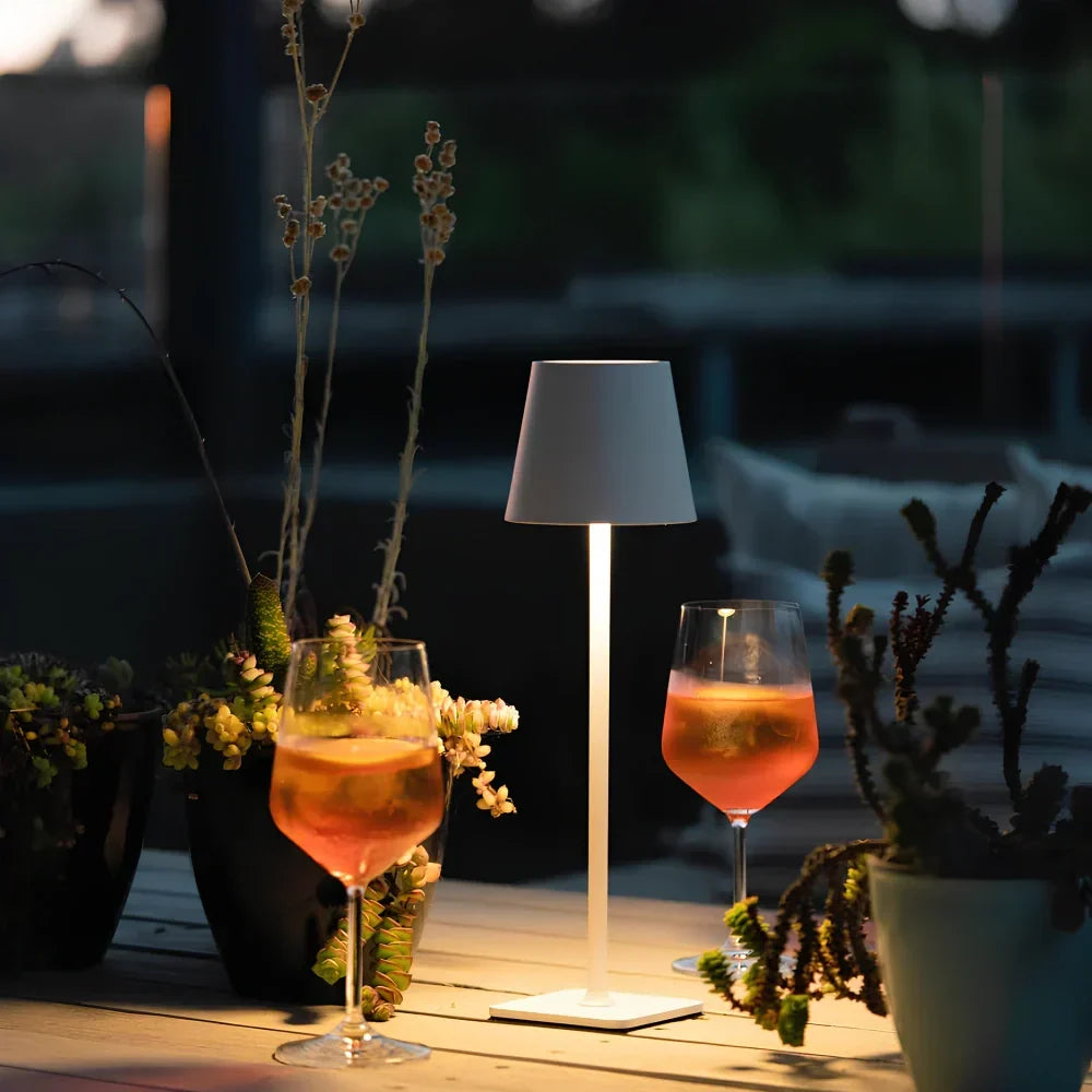 Cordless dimmable LED table lamp, modern design. Rechargeable for convenient indoor/outdoor light.