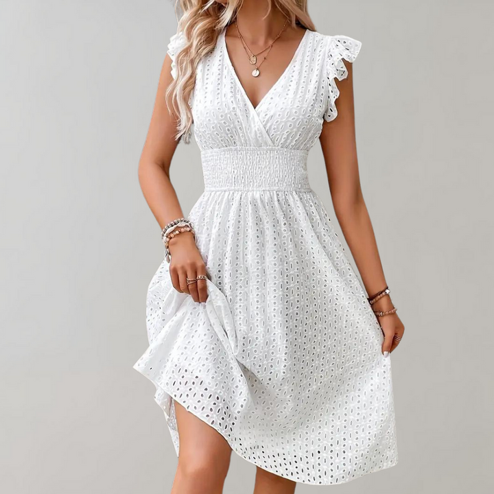 Elegant women's white midi summer dress, featuring delicate ruffled short sleeves. Versatile for any event.
