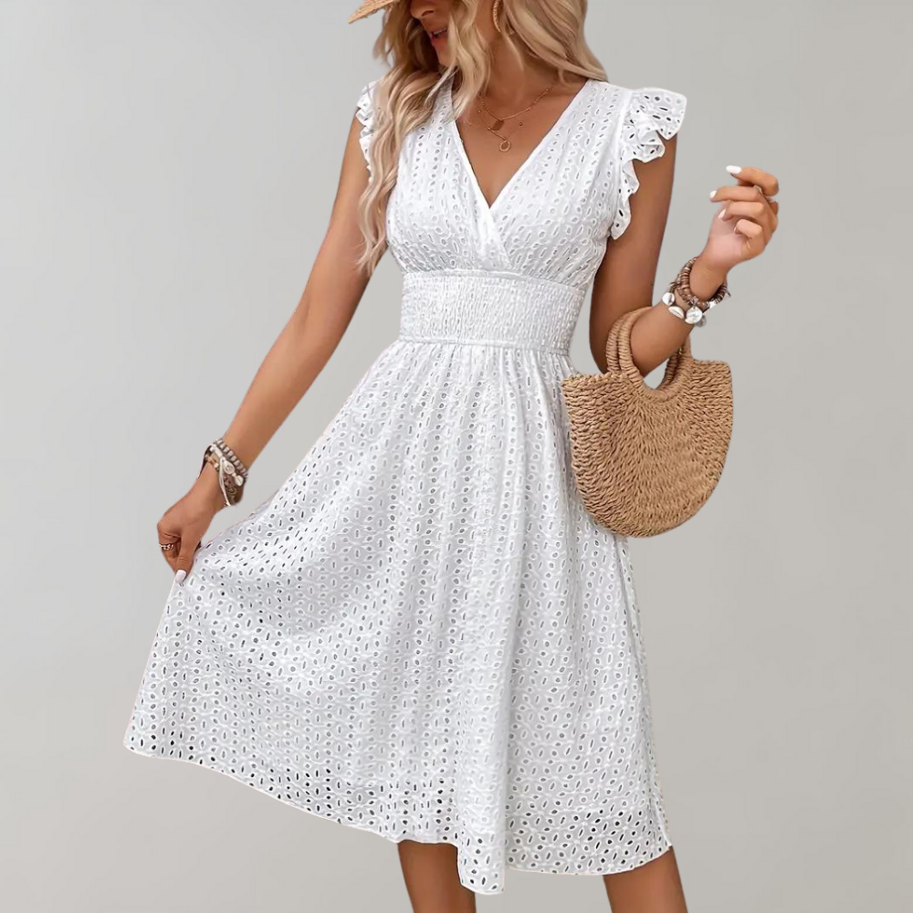 Women's white summer dress with elegant ruffled sleeves. Perfect for casual or semi-formal occasions.