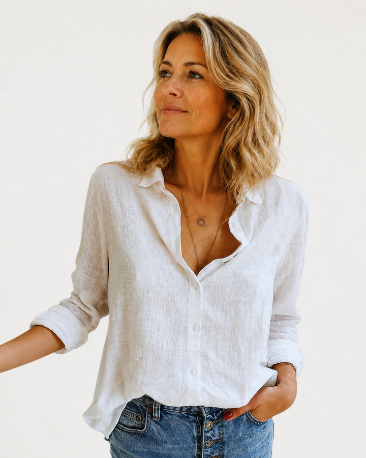 Women's button-down long sleeve blouse, a versatile collared top for effortless everyday wear and office attire.