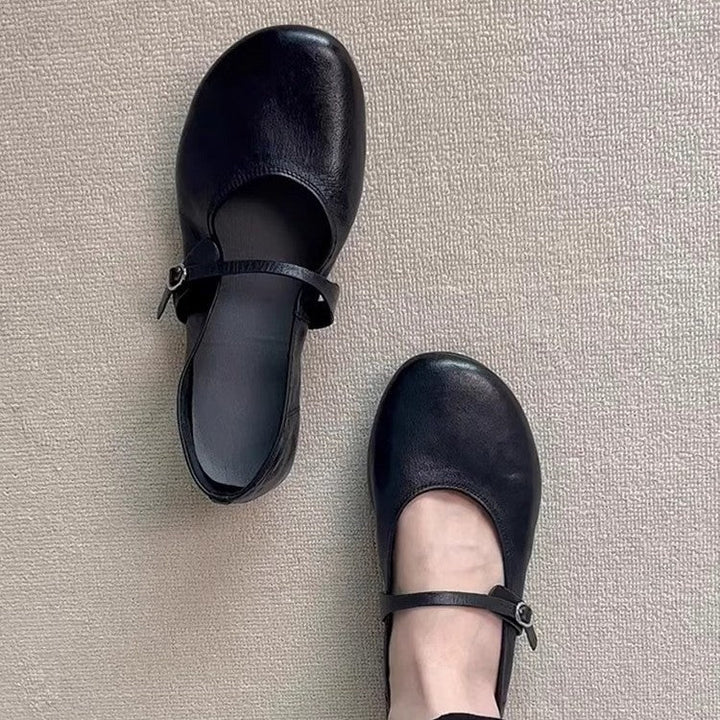 Women's chic round toe Mary Jane flats with adjustable strap, ideal for comfortable everyday wear.