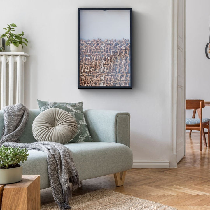 Stylish wine cork frame, perfect wall display holder for cherished corks, enhancing home or kitchen decor.
