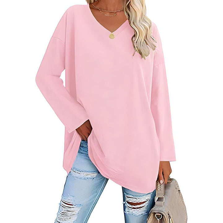 Stylish women's long sleeve V-neck tunic. Perfect for layering or everyday comfort and fashion.