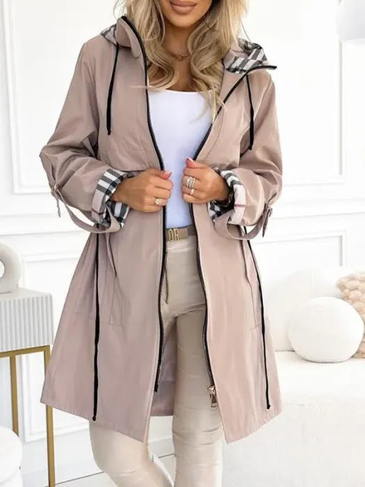 Chic women's hooded winter coat. Cozy zip-front design offers warmth & weather protection. Versatile everyday outerwear.