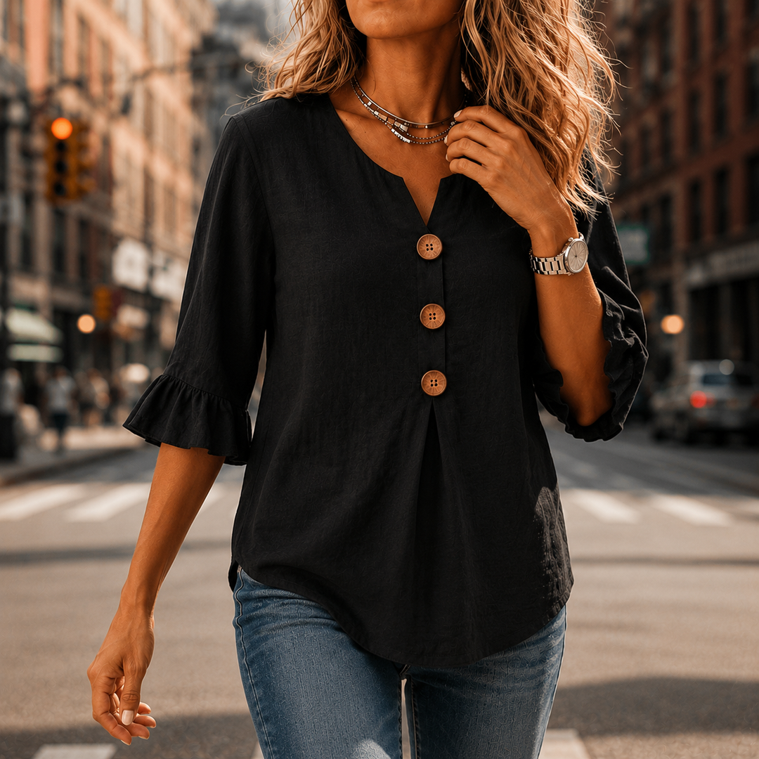 Winslow women's button-front blouse, a sophisticated V-neck top with stylish ruffle sleeves for work.