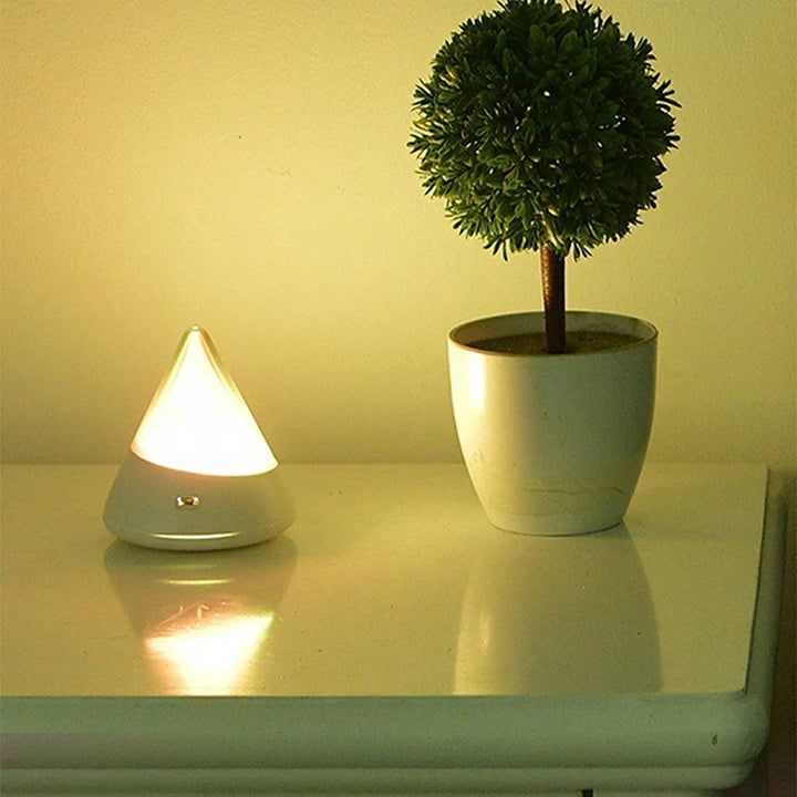 Portable rechargeable LED Iceberg night light, providing wireless multicolour glow for any room ambiance.