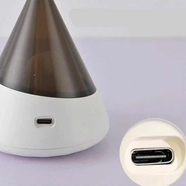 IceGlow wireless LED night light, a portable iceberg-shaped lamp for ambient and modern home lighting.