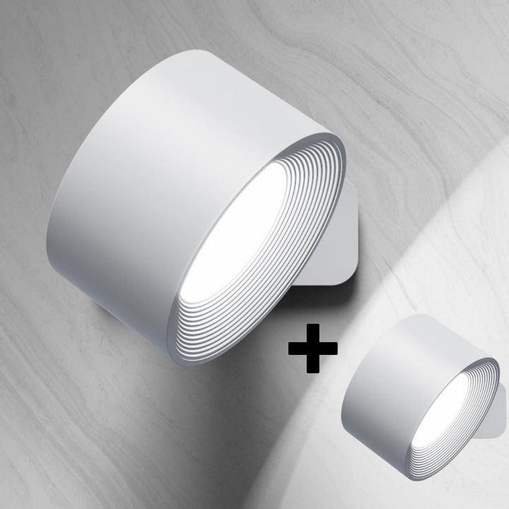 Modern wireless LED wall lamp featuring 360° rotation and touch control for customizable light direction.