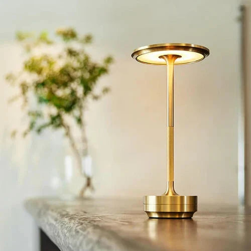 Modern wireless USB rechargeable table lamp, GlowBeam, with dimmable light for portable home decor.